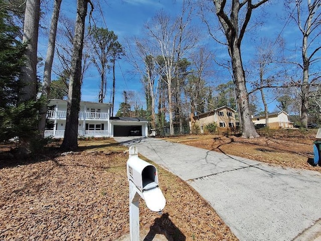 view of front of property with a garage and driveway