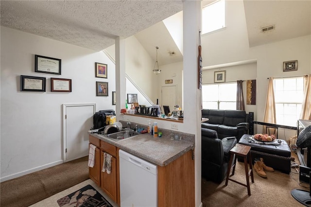 kitchen with white dishwasher, a textured ceiling, sink, carpet, and high vaulted ceiling