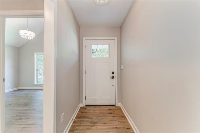 14 Brook Valley Ct SW, Rome, GA 30165 - doorway to outside featuring light wood-type flooring, plenty of natural light, and baseboards