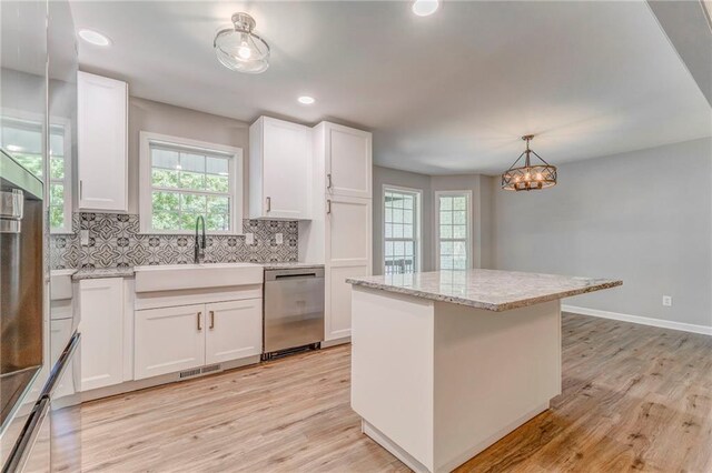 14 Brook Valley Ct SW, Rome, GA 30165 - kitchen featuring dishwasher, a sink, decorative backsplash, healthy amount of natural light, and recessed lighting