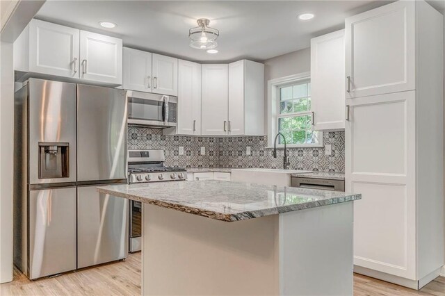 14 Brook Valley Ct SW, Rome, GA 30165 - kitchen with stainless steel appliances, a sink, white cabinetry, and recessed lighting