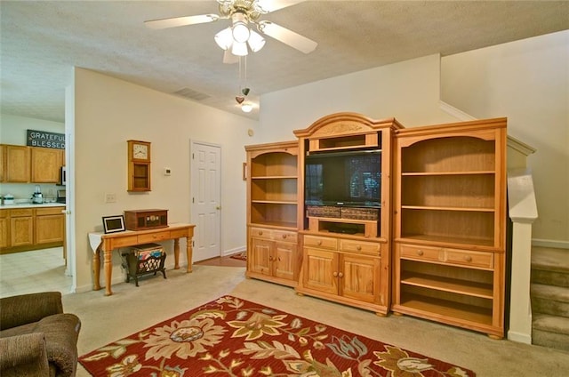 809 Longbranch Ln, Douglasville, GA 30134 - living area with light colored carpet, ceiling fan, a textured ceiling, and baseboards