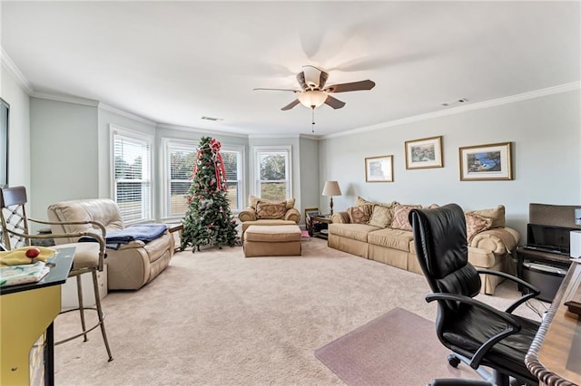 office featuring crown molding, light carpet, and ceiling fan