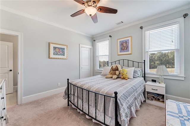 carpeted bedroom with crown molding, multiple windows, and ceiling fan