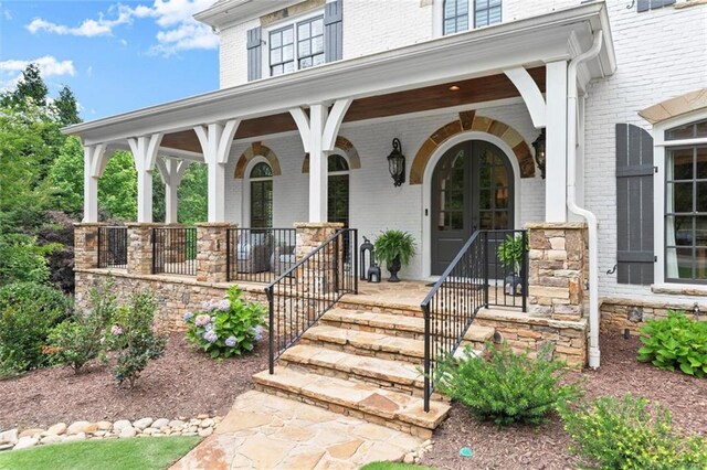 15910 Meadow King Way, Milton, GA 30004 - entrance to property featuring brick siding and covered porch