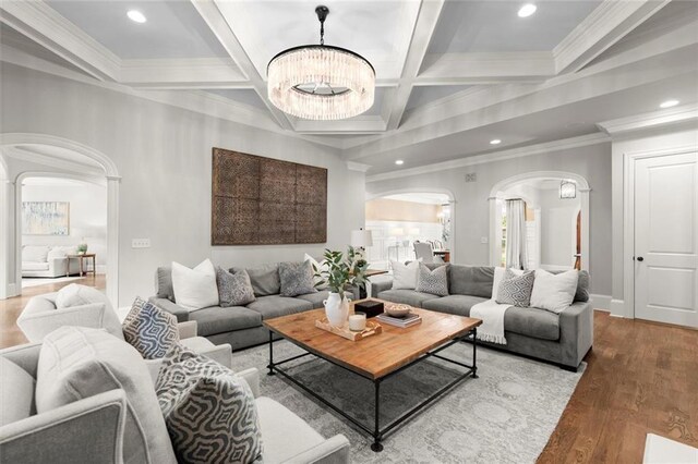 15910 Meadow King Way, Milton, GA 30004 - living area featuring arched walkways, beamed ceiling, wood finished floors, coffered ceiling, and recessed lighting