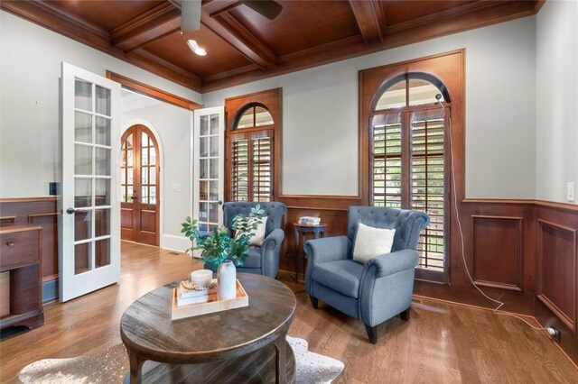 15910 Meadow King Way, Milton, GA 30004 - living area with french doors, wood finished floors, beamed ceiling, a wainscoted wall, and ceiling fan
