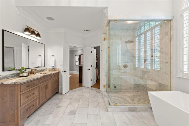 15910 Meadow King Way, Milton, GA 30004 - bathroom featuring a freestanding bath, a shower stall, vanity, and crown molding