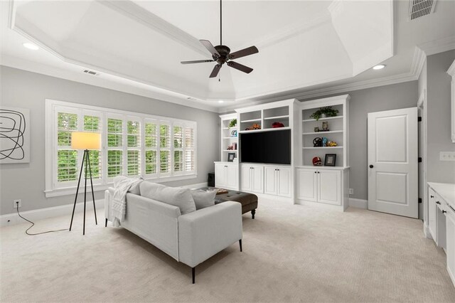 15910 Meadow King Way, Milton, GA 30004 - living area with a raised ceiling, light colored carpet, ornamental molding, ceiling fan, and healthy amount of natural light