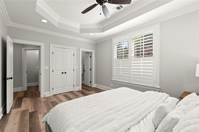 15910 Meadow King Way, Milton, GA 30004 - bedroom featuring a raised ceiling, wood finished floors, recessed lighting, crown molding, and ceiling fan