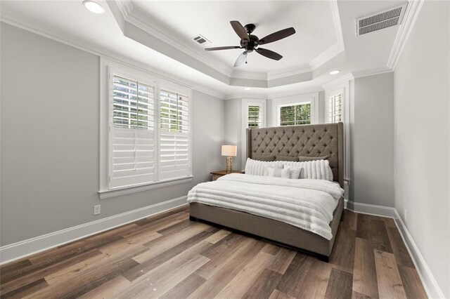 15910 Meadow King Way, Milton, GA 30004 - bedroom featuring a tray ceiling, wood finished floors, ornamental molding, a ceiling fan, and recessed lighting