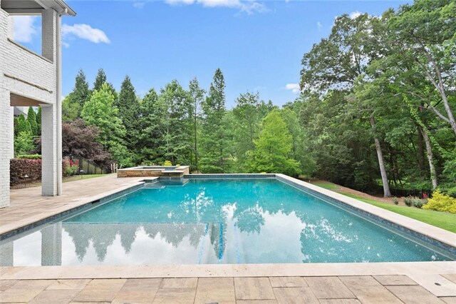 15910 Meadow King Way, Milton, GA 30004 - view of swimming pool featuring a patio area and a pool with connected hot tub