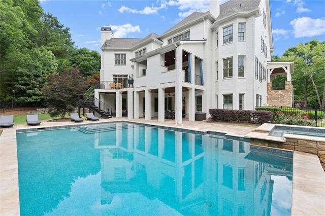 15910 Meadow King Way, Milton, GA 30004 - view of swimming pool featuring stairs, an in-ground hot tub, and a patio