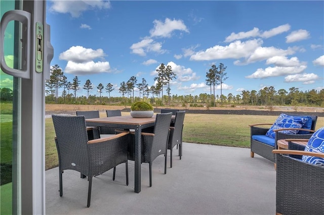 view of patio featuring outdoor dining space