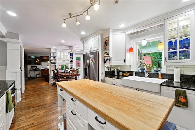 1438 Salem Dr, Alpharetta, GA 30009 - kitchen with stainless steel refrigerator with ice dispenser, wood counters, white cabinets, a ceiling fan, and decorative backsplash
