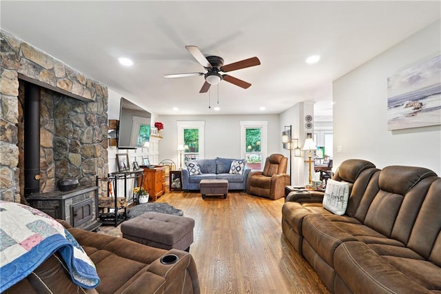 1438 Salem Dr, Alpharetta, GA 30009 - living area featuring ceiling fan, a wood stove, wood-type flooring, and recessed lighting