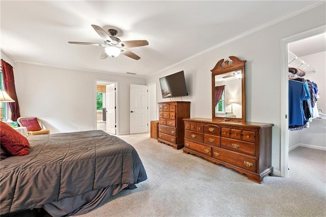 1438 Salem Dr, Alpharetta, GA 30009 - bedroom with carpet floors, a spacious closet, ornamental molding, a ceiling fan, and a closet