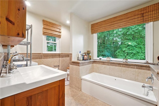 1438 Salem Dr, Alpharetta, GA 30009 - bathroom with a bath, tile walls, tile patterned flooring, vanity, and a wainscoted wall