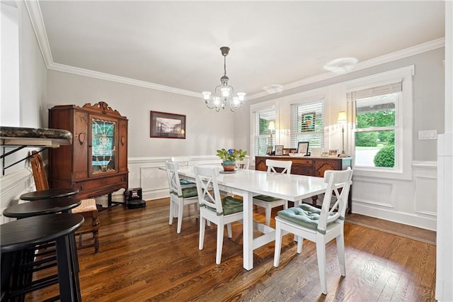 1438 Salem Dr, Alpharetta, GA 30009 - dining area featuring ornamental molding, a chandelier, dark wood finished floors, wainscoting, and a decorative wall
