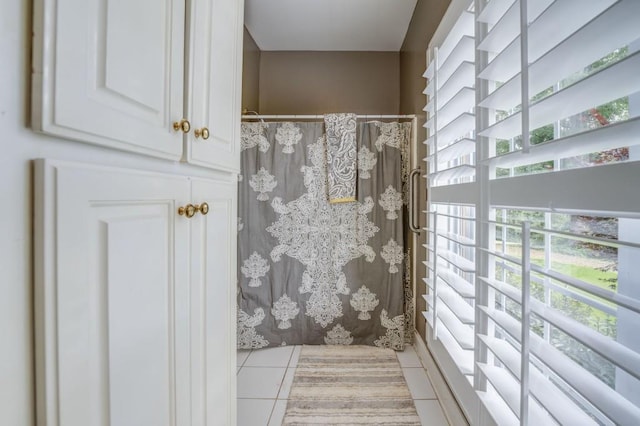 bathroom featuring tile patterned flooring