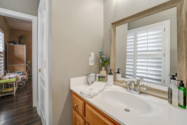 bathroom featuring vanity and wood-type flooring