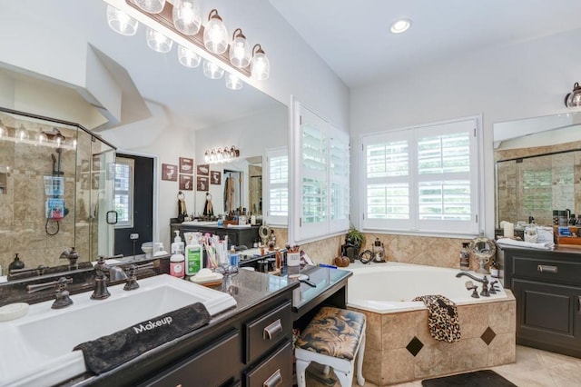 full bathroom featuring tile patterned flooring, vanity, plus walk in shower, and toilet