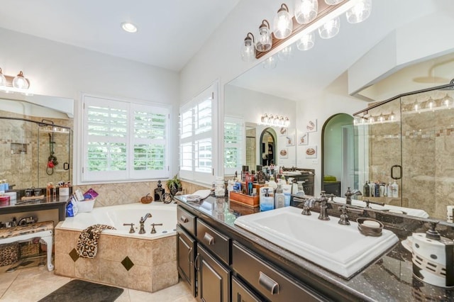 bathroom with vanity, separate shower and tub, and tile patterned flooring