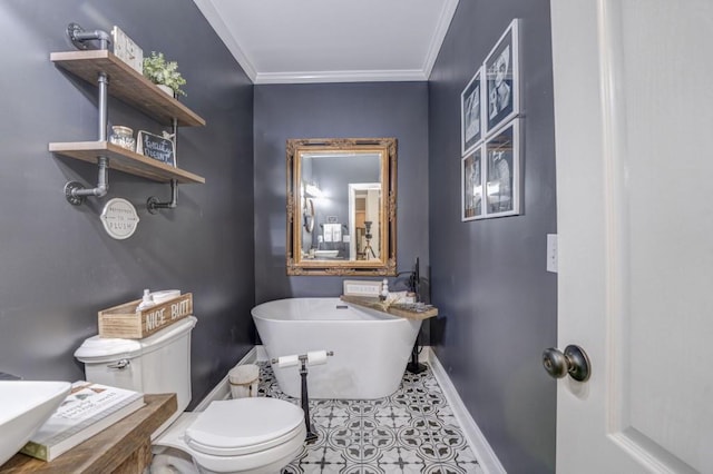 bathroom with tile patterned floors, ornamental molding, toilet, and a tub