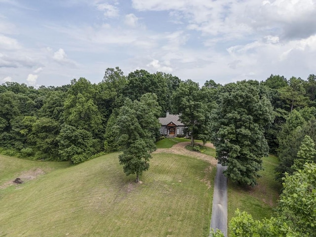 birds eye view of property with a rural view