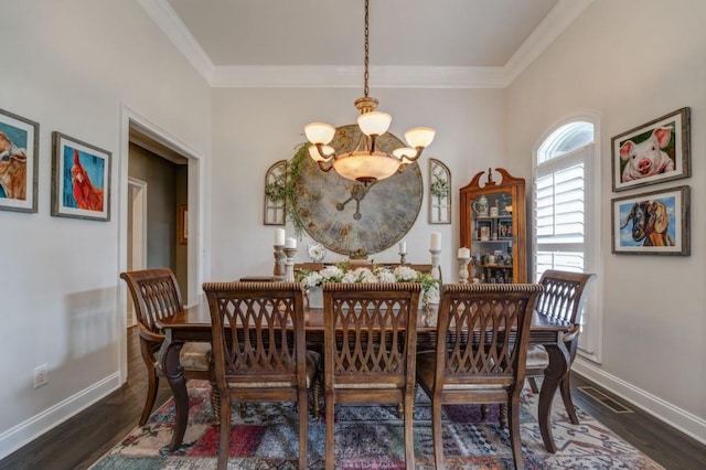 dining area with crown molding, an inviting chandelier, and dark hardwood / wood-style flooring