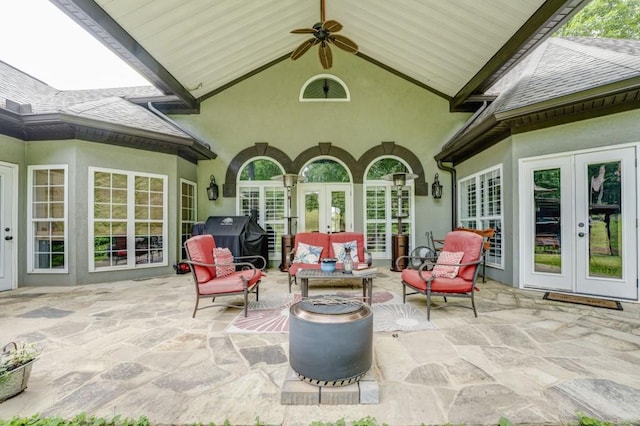 view of patio featuring french doors, area for grilling, outdoor lounge area, and ceiling fan