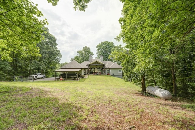 view of yard featuring a carport