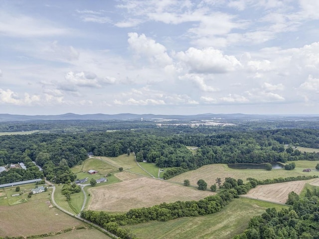 aerial view with a mountain view and a rural view