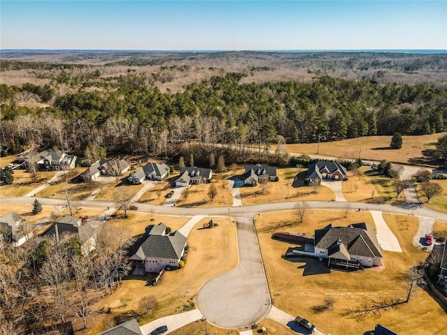 drone / aerial view of a heavily wooded area