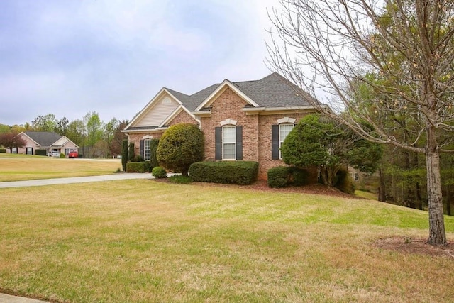 118 Jasmine Way, Carrollton, GA 30180 - traditional-style house featuring brick siding and a front yard