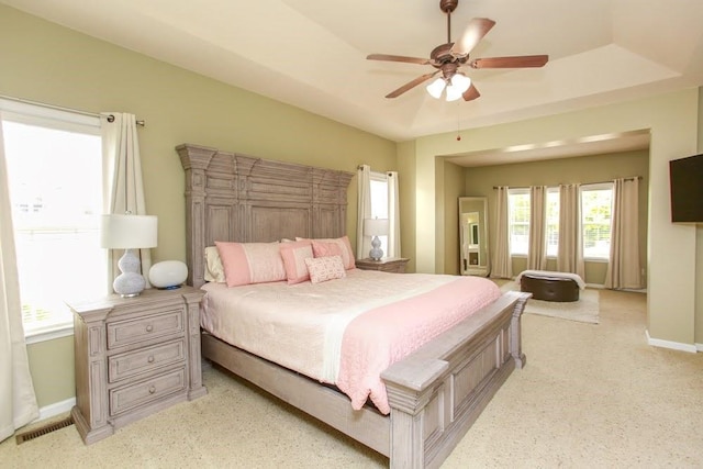 bedroom with baseboards and ceiling fan