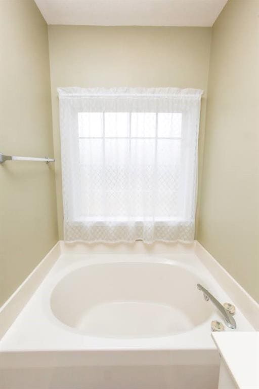 bathroom with a bath