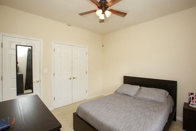 bedroom with baseboards, a closet, and ceiling fan
