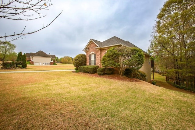 118 Jasmine Way, Carrollton, GA 30180 - traditional-style house featuring a front lawn and brick siding