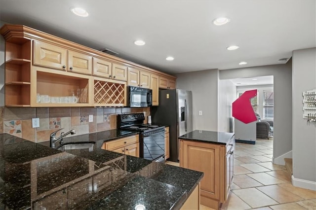 kitchen featuring light brown cabinets, recessed lighting, a peninsula, decorative backsplash, and black appliances