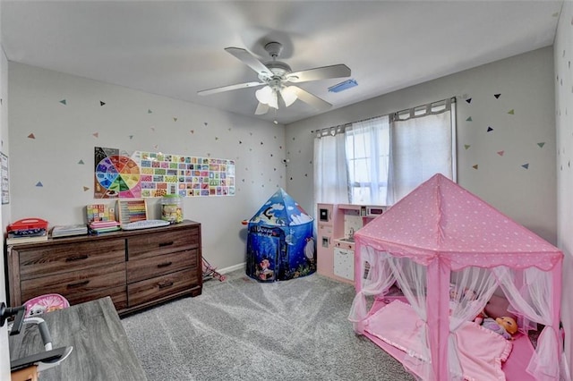 carpeted bedroom featuring ceiling fan