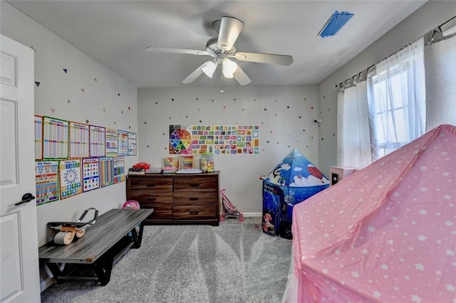 carpeted bedroom featuring ceiling fan