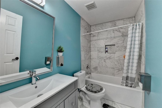 full bathroom with vanity, shower / bathtub combination with curtain, and toilet