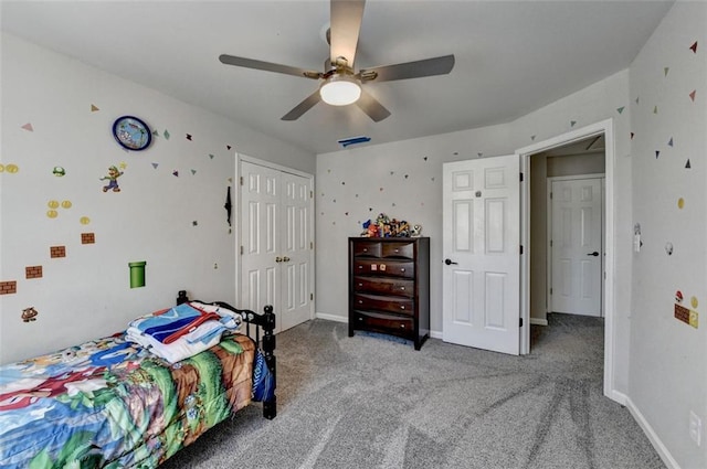 bedroom featuring carpet, a closet, and ceiling fan