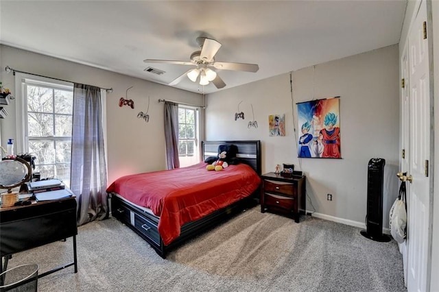 carpeted bedroom featuring ceiling fan