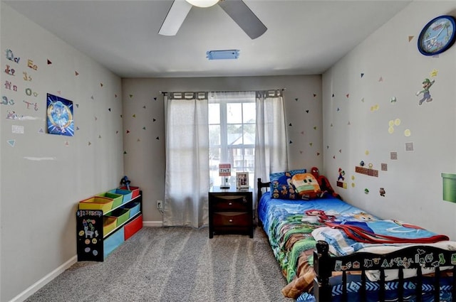 bedroom with ceiling fan and carpet floors