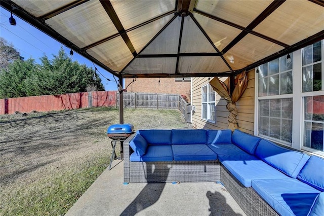 view of patio / terrace with a gazebo and outdoor lounge area