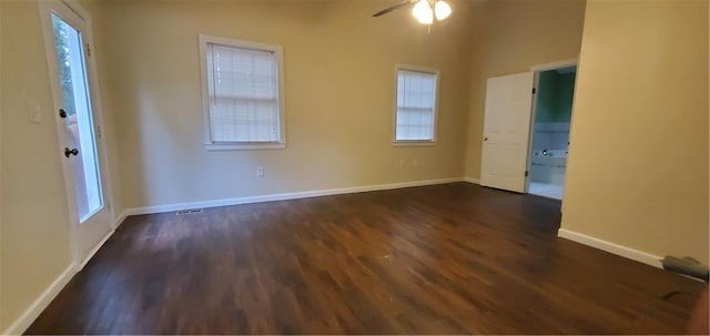 unfurnished room with ceiling fan, baseboards, and wood finished floors