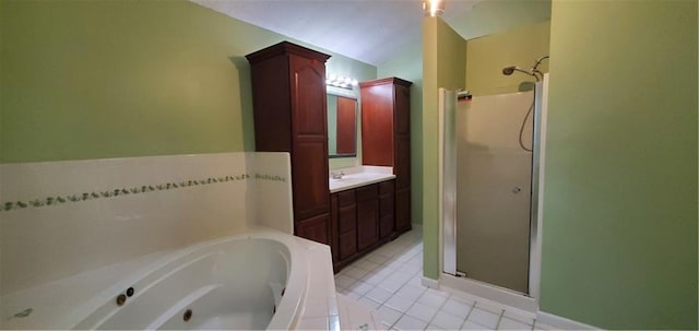 full bath featuring vanity, a bath, a shower stall, and tile patterned flooring