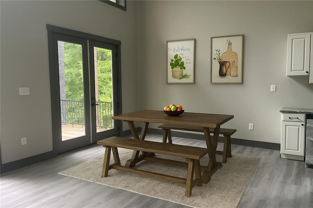 221 Dragonfly Cv, Toccoa, GA 30577 - dining space featuring light wood-style flooring and french doors